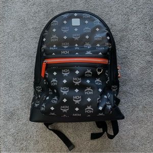MCM Stark Visetos medium black/orange backpack